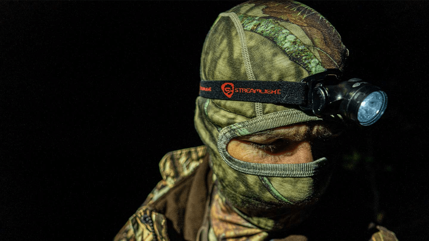 closeup of man wearing minus33 merino wool balaclava and headlamp