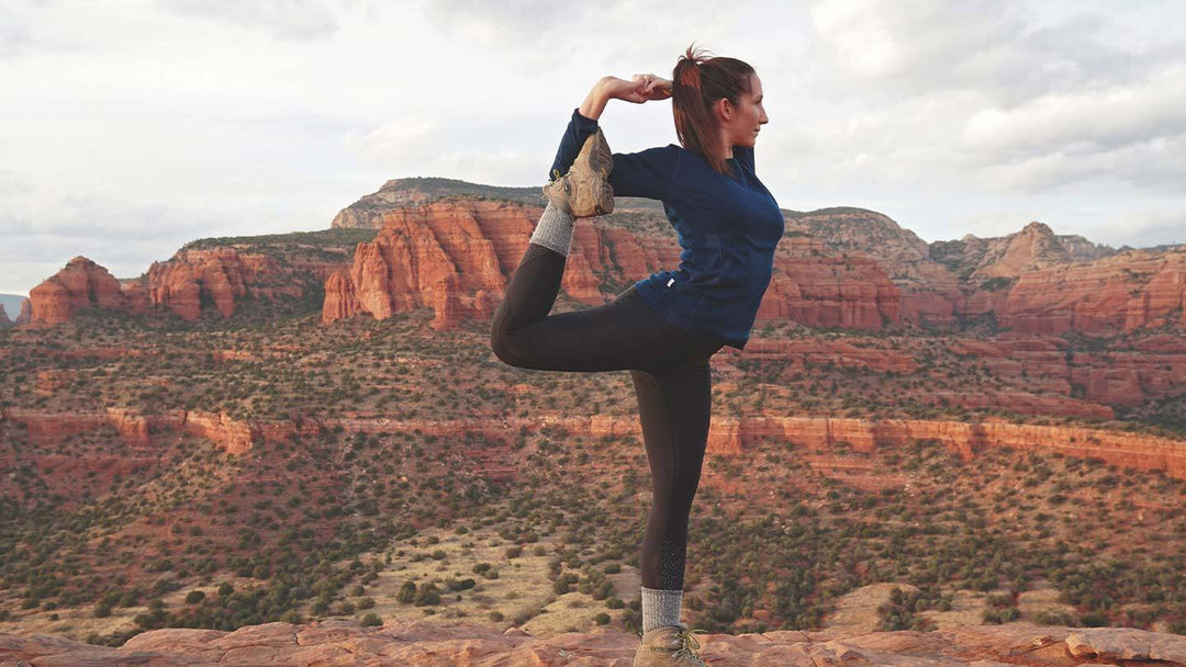 woman doing yoga in arizona while wearing minus33 merino wool midweight crew top