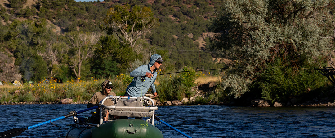 men hunting in the fall wearing merino wool base layers and beanies 