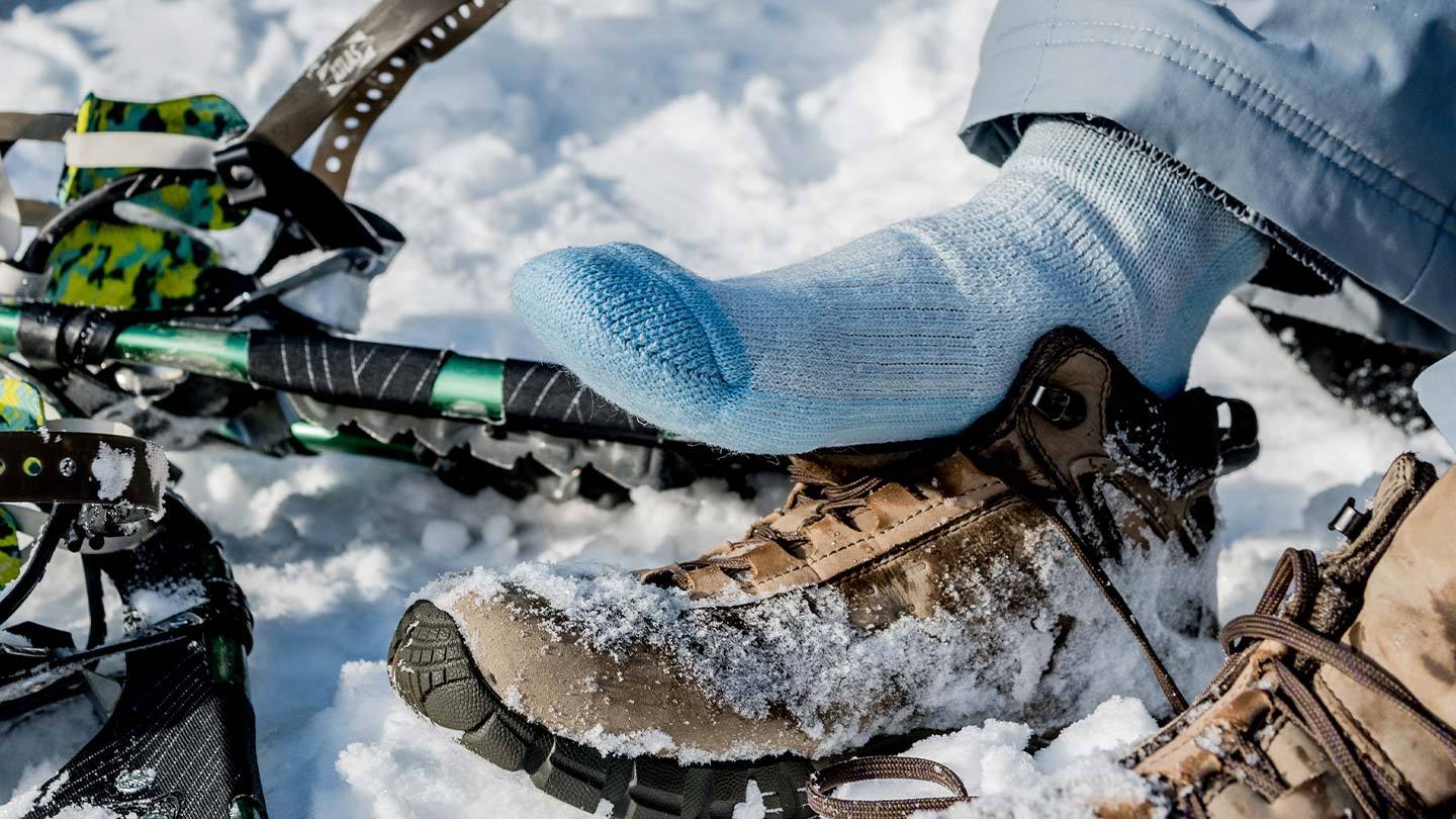 closeup of minus33 merino wool day hiker socks in the snow